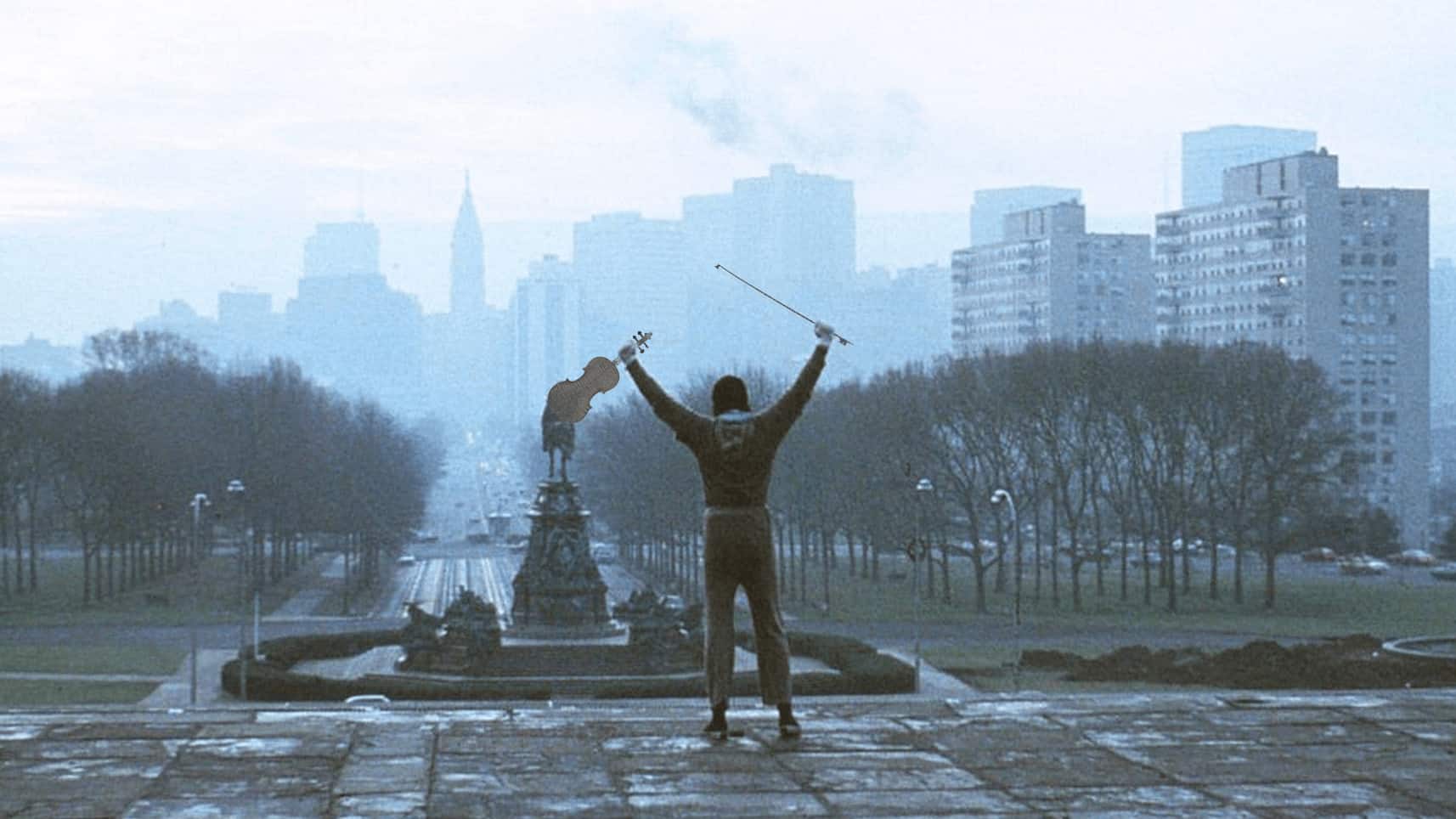 Rocky holds violin at top of Art Institute steps